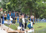 Unila dan Forpimawa Tanam Pohon dan Tebar Benih Ikan di Embung Rusunawa